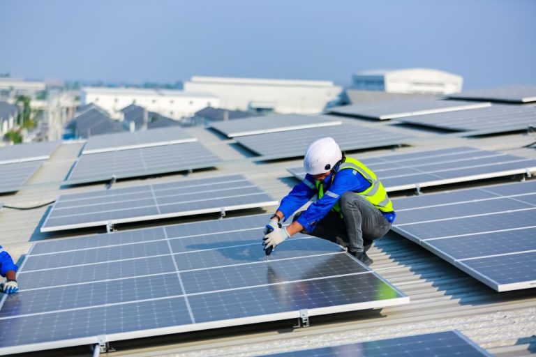 solar-panel-installer-installing-solar-panels